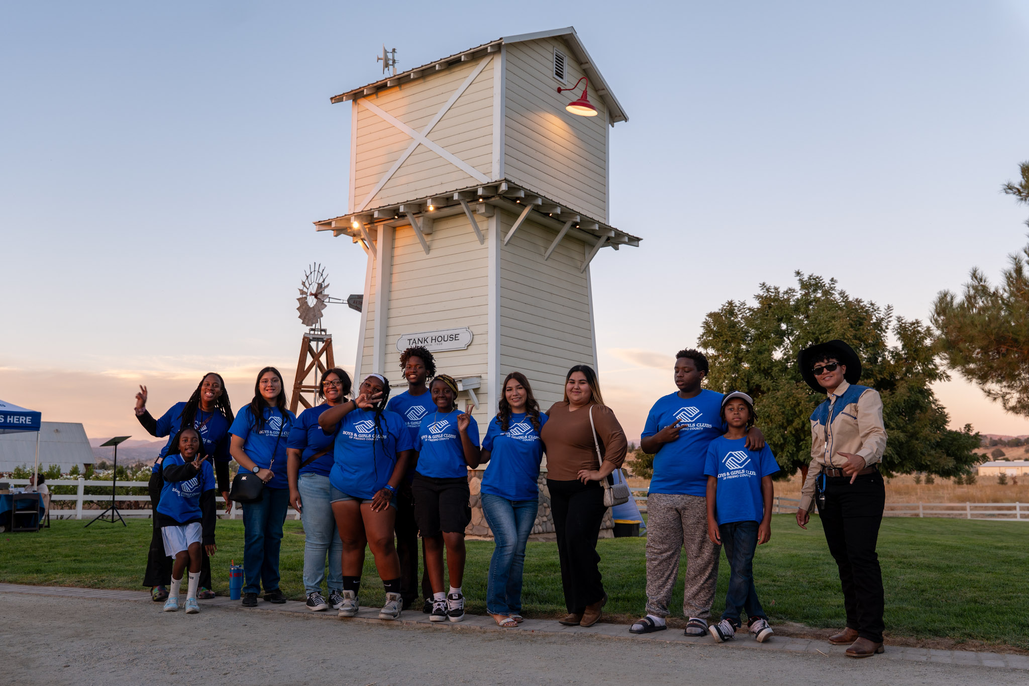 Boys and Girls Clubs youth and supporters gathered beneath the tower at Academy Homestead Ranch