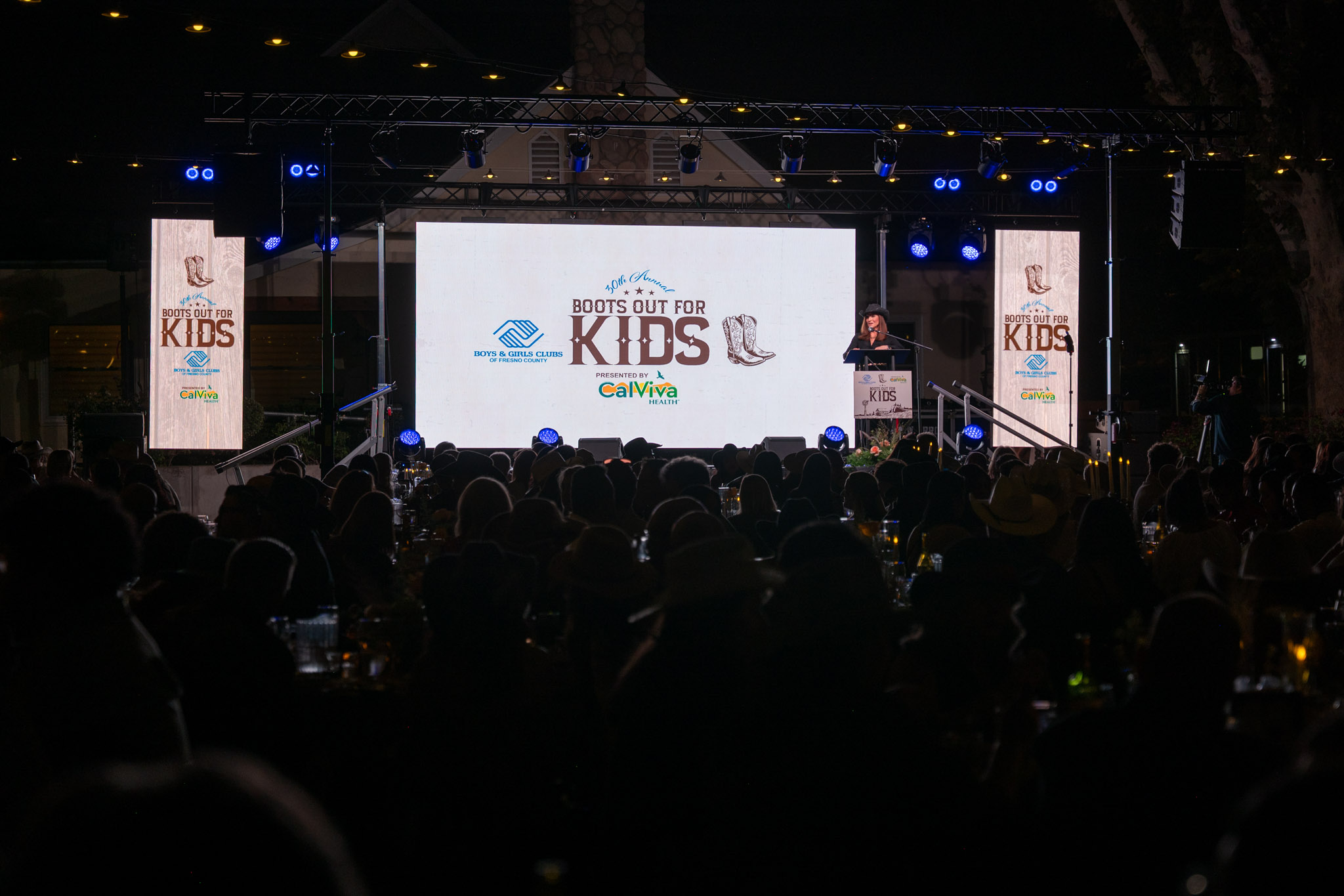 Guests watching the stage during the 2026 Boots Out for Kids Gala in Clovis